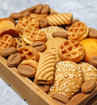 various cookies in wooden tray